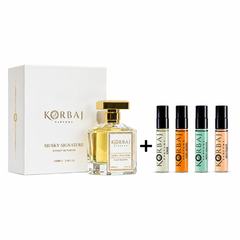 Korbaj Musky Signature Extrait de Parfum 100ml perfume with four-piece discovery set on white background