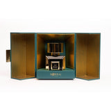 Front view of Korbaj Jade Royale 100ml citrus woody perfume in a full-size emerald bottle inside an open teal and gold presentation box.