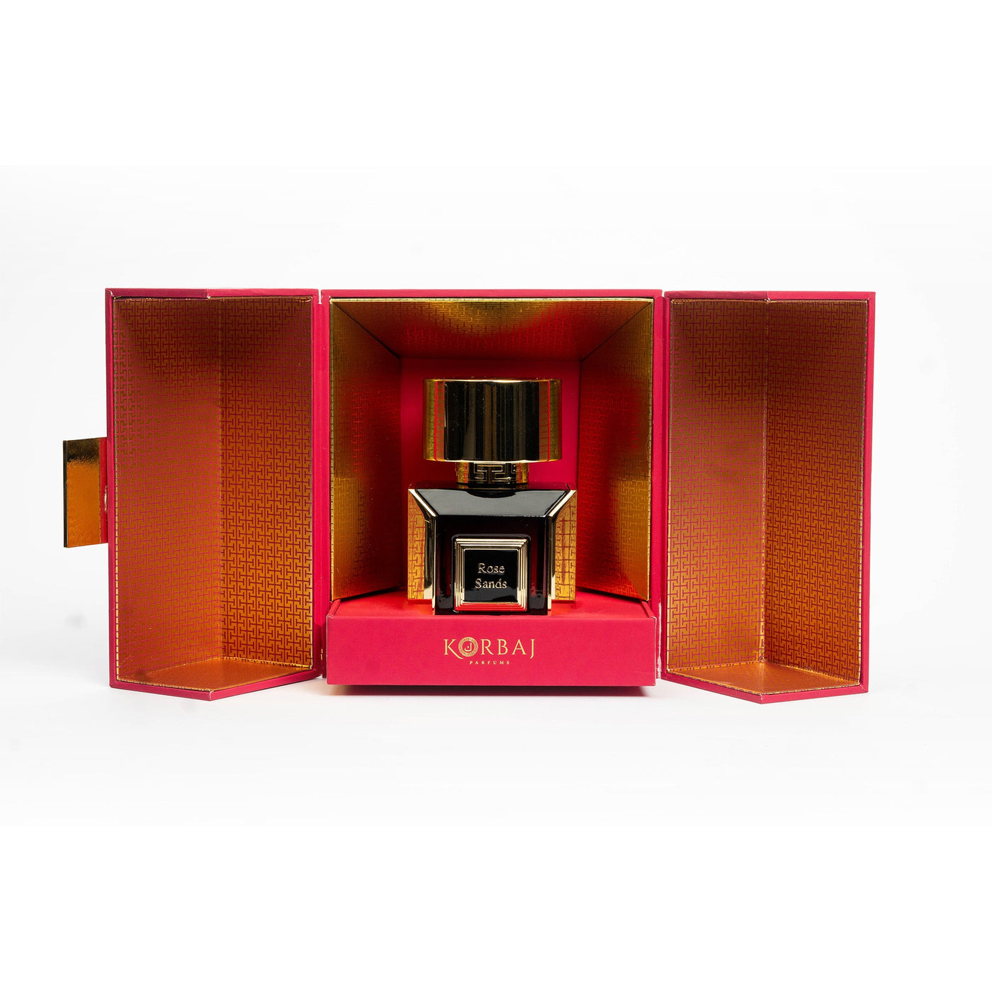Angled view of Korbaj Scarlet Amber 100ml floral amber perfume in a full-size bottle inside an open red and gold presentation box.