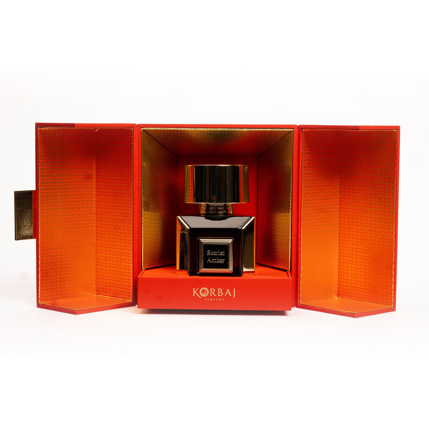 Front view of Korbaj Scarlet Amber 100ml floral amber perfume in a full-size bottle inside its open red and gold presentation box.
