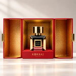 Korbaj Scarlet Amber 100ml unisex floral amber perfume: bottle inside its open red presentation box with a gold lining.