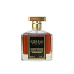 Close front view of Korbaj Toxic Desire 100ml gourmand woody perfume, showing amber liquid, gold cap and black label.